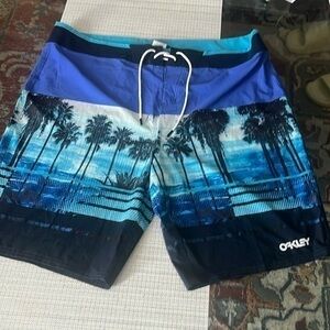 Oakley men’s trunks, size 40, blue , palm trees, blue & black